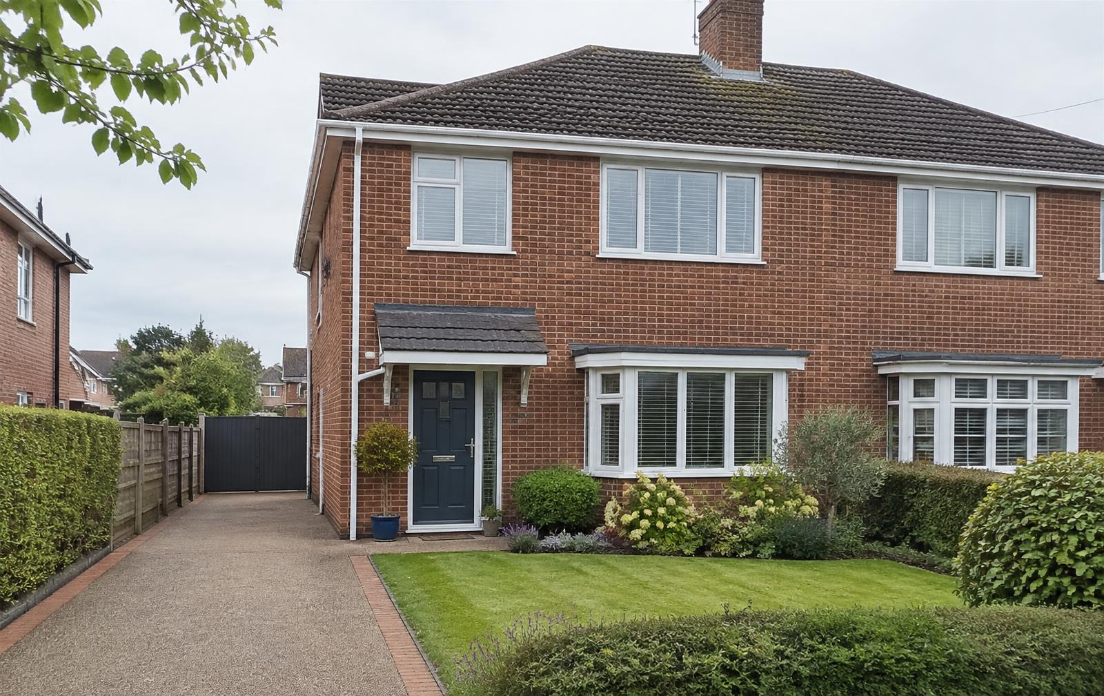 A well-maintained brick semi-detached house